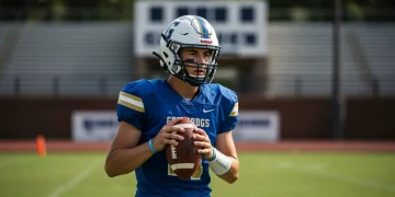 High school football player looking towards college stadium, symbolizing academic and athletic aspirations.