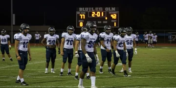 High School Football: 2025 Equipment Costs & Fundraising High school football team on field with modern equipment