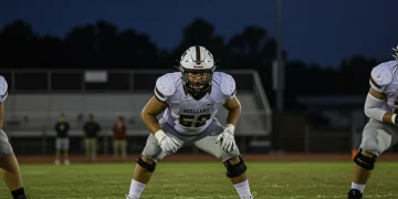 High school offensive lineman in ready stance