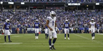 NFL Sunday: Top 5 Offensive Breakdowns (2026 Analysis) Dejected quarterback after an offensive breakdown in an NFL Sunday game, 2026 season