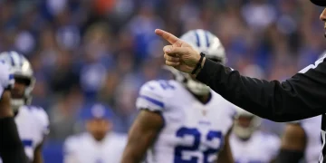 2026 NFL Game Recaps: Unpacking 4 Controversial Calls Referee making a controversial call during a 2026 NFL game
